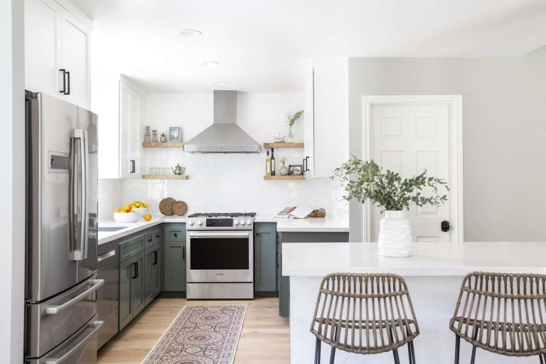 fresh-white-kitchen-with-green-cabinets-1226027912-845e426ac50442499f1735cd6cc9e6d0